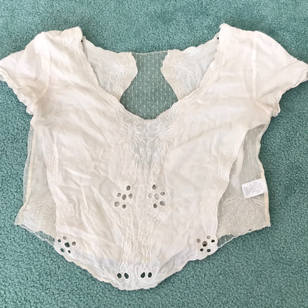White crop top with cap sleeves and lace detail